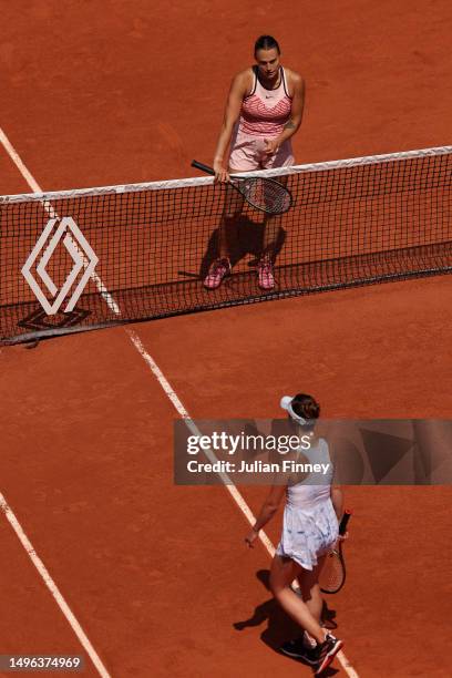 Aryna Sabalenka gives a thumbs up to Elina Svitolina of Ukraine as she refuses to shake hands after the Women's Singles Quarter Final match on Day...