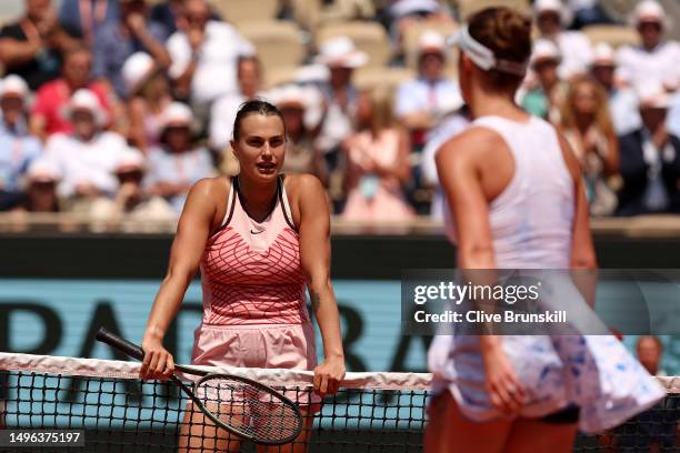 Aryna Sabalenka waits at the net as Elina Svitolina of Ukraine refuses to shake hands after the Women's Singles Quarter Final match on Day Ten of the...