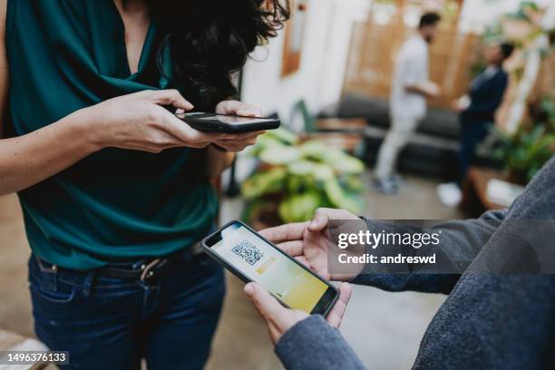 check in using smartphone qr code - qr code stock pictures, royalty-free photos & images