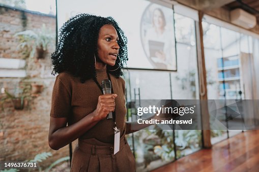 Woman giving speaker presentation