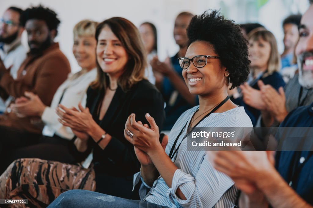 Group of people applauding