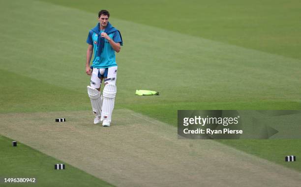 Pat Cummins of Australia inspects the pitch during Australia training prior to the ICC World Test Championship Final 2023 at The Oval on June 06,...