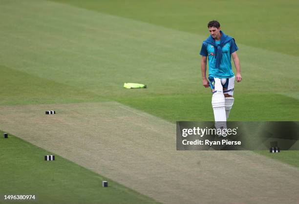 Pat Cummins of Australia inspects the pitch during Australia training prior to the ICC World Test Championship Final 2023 at The Oval on June 06,...