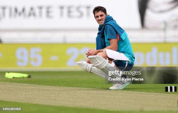 Pat Cummins of Australia inspects the pitch during Australia training prior to the ICC World Test Championship Final 2023 at The Oval on June 06,...