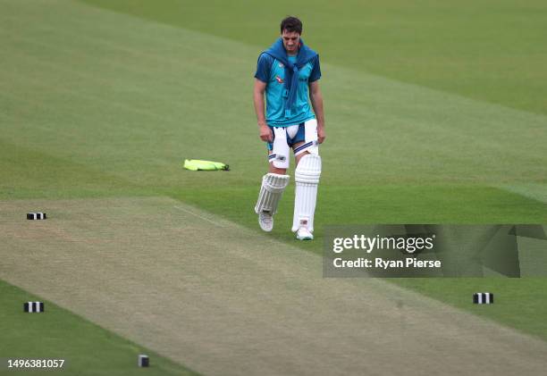 Pat Cummins of Australia inspects the pitch during Australia training prior to the ICC World Test Championship Final 2023 at The Oval on June 06,...