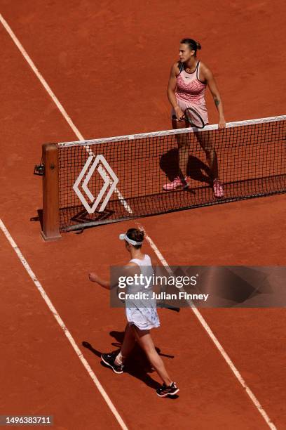 Aryna Sabalenka waits at the net as Elina Svitolina of Ukraine refuses to shake hands after the Women's Singles Quarter Final match on Day Ten of the...