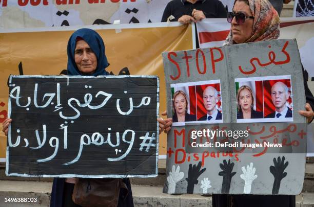 Activists demonstrate outside the Municipal Theatre in Tunis, June 6 2023, against Italian Prime Minister Giorgia Meloni's visit to Tunisia....