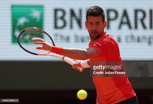 Novak Djokovic of Serbia plays a forehand against Karen Khachanov during the Men's Singles Quarter Final match on Day Ten of the 2023 French Open at...