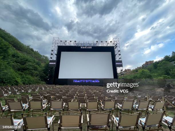 Large screen is set up prior to the "Transformers: Rise of the Beasts" China premiere at Jinshanling resort on June 5, 2023 in Luanping County,...