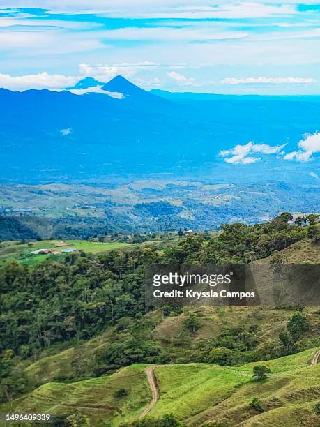landscape with view towards volcanoes in costa rica - tenorio volcano national park stock pictures, royalty-free photos & images