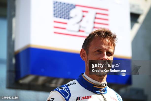Jenson Button of Great Britain and Hendrick Motorsports Chevrolet Camaro ZR1 talks to the media during previews to the 100th Anniversary Le Mans 24...