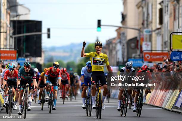 General view of Christophe Laporte of France and Team Jumbo-Visma - Yellow leader jersey celebrates at finish line as stage winner ahead of Sam...