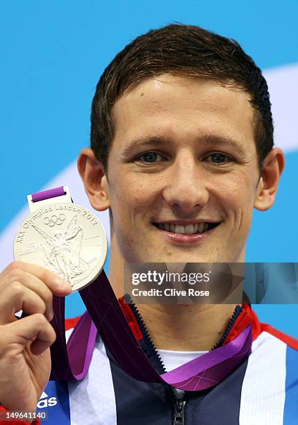 Michael Jamieson of Great Britain celebrates with his silver medal during the medal ceremony for the Men's 200m Breaststroke on Day 5 of the London...