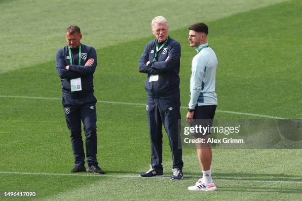 Declan Rice of West Ham United, David Moyes , Manager of West Ham United and Billy McKinlay , Assistant Manager of West Ham United inspect the pitch...