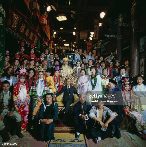 Philanthropist and entertainment mogul Sir Run Run Shaw surrounded by the stars of Hong Kong cinema, 1979.
