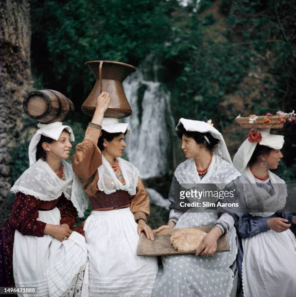 Women wearing traditional dress in Anticoli Corrado, Italy, 1960.
