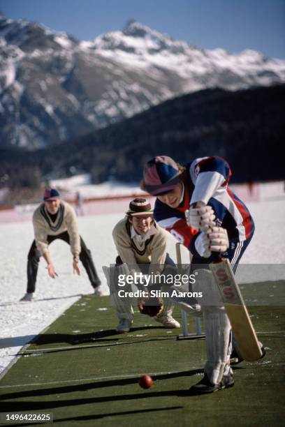 Game of cricket being played next to the ski slopes in St. Moritz, Switzerland, 1989.