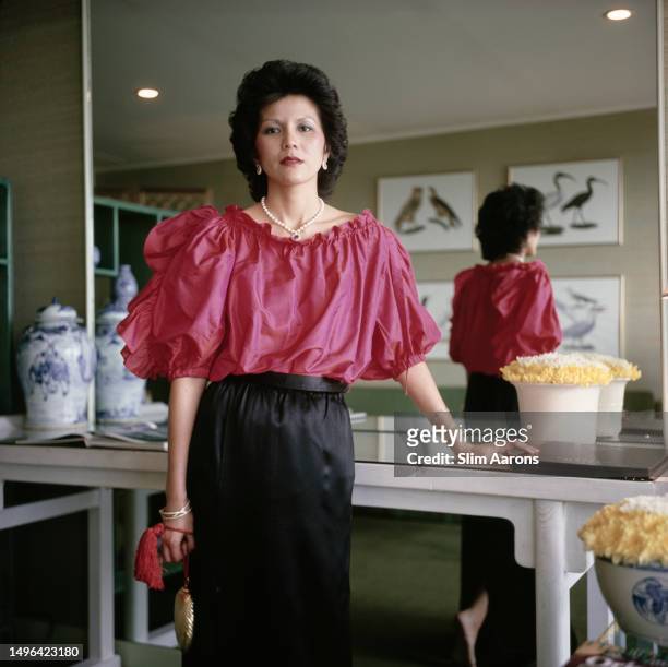 'Club 21' Fashion boutique owner Christina Ong in one of the exclusive 12 suites created by Hubert de Givenchy for the Singapore Hilton Hotel, 1982.
