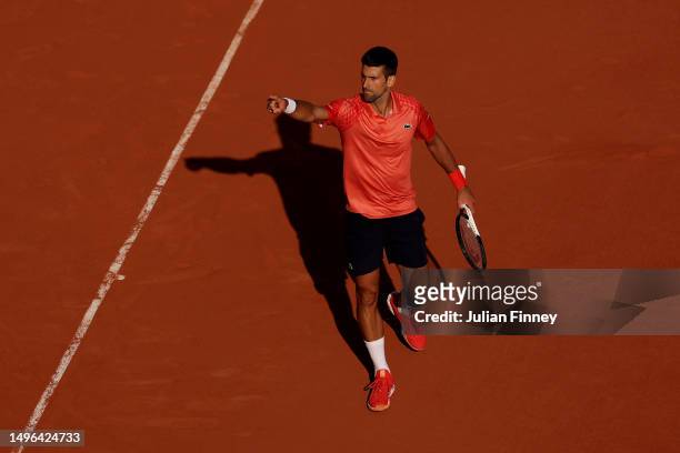 Novak Djokovic of Serbia reacts against Karen Khachanov during the Men's Singles Quarter Final match on Day Ten of the 2023 French Open at Roland...