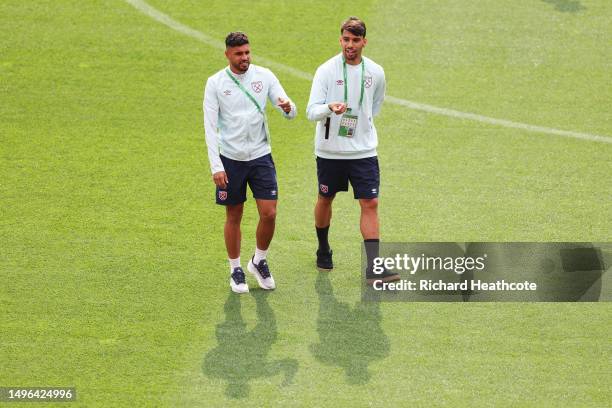 Emerson Palmieri and Lucas Paqueta of West Ham United inspect the pitch prior to the UEFA Europa Conference League 2022/23 final match between ACF...