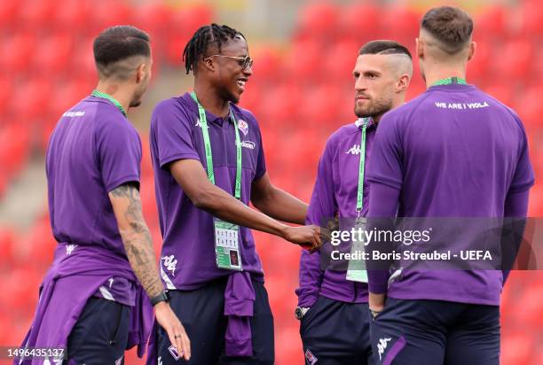 Cristian Kouame of ACF Fiorentina inspects the pitch with teammates ahead of the UEFA Europa Conference League 2022/23 final match between ACF...