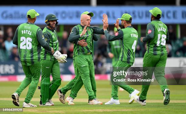 Callum Parkinson of Leicestershire is congratulated after taking the wicket of Dawid Malan of Yorkshire the Leicestershire Foxes and Yorkshire...