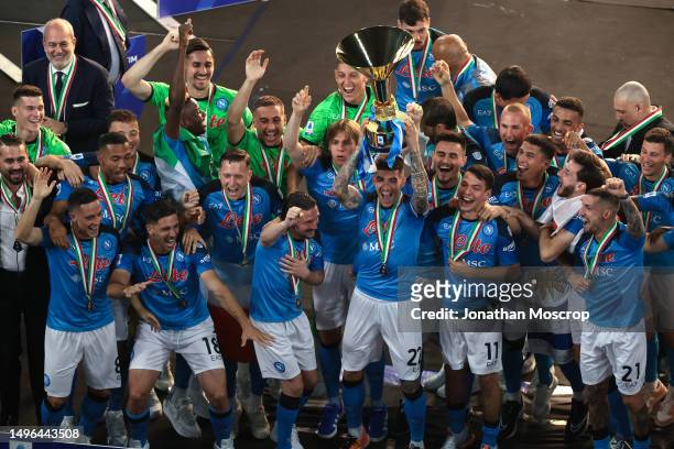 Giovanni Di Lorenzo of SSC Napoli lifts the trophy as team mates celebrate following the Serie A match between SSC Napoli and UC Sampdoria at Stadio...