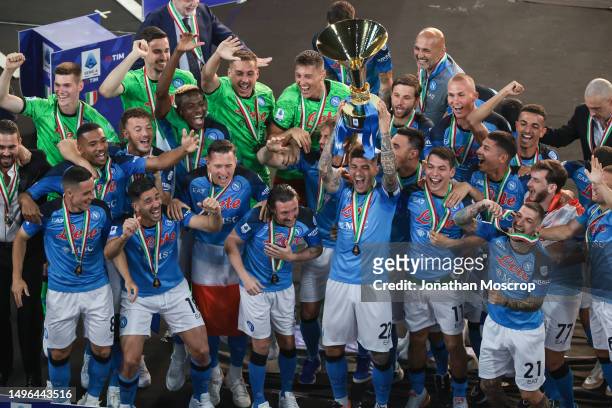Giovanni Di Lorenzo of SSC Napoli lifts the trophy as team mates celebrate following the Serie A match between SSC Napoli and UC Sampdoria at Stadio...