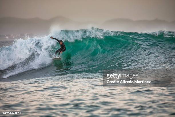 Surfer enjoys the waves at Los Cerritos beach on June 03, 2023 in La Paz, Mexico. Big-wave conditions in Baja California Sur reach a pick between May...