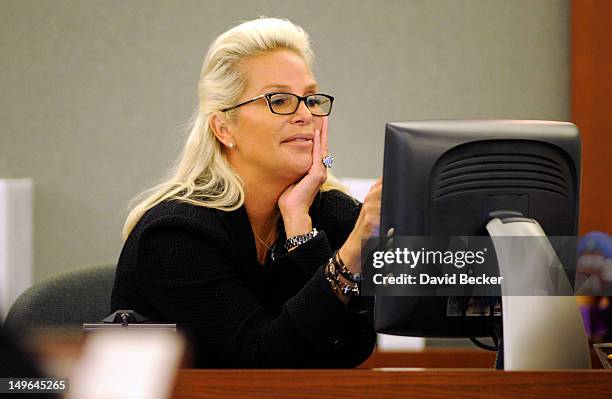 Kathleen McCrone Newton testifies on the witness stand during a court hearing at the Clark County Regional Justice Center on August 1, 2012 in Las...