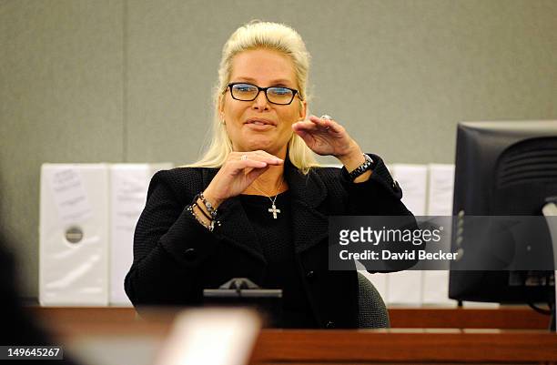 Kathleen McCrone Newton testifies on the witness stand during a court hearing at the Clark County Regional Justice Center on August 1, 2012 in Las...