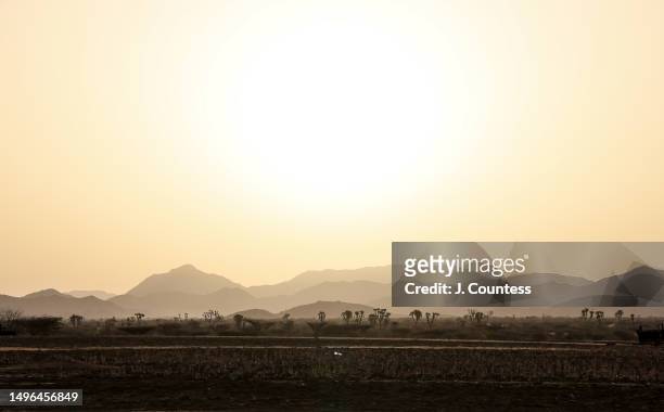 The sun rises over the northeastern reaches of the Gash Barka region towards the Barka River on May 22, 2023 in Akordat, Eritrea. When crops are...