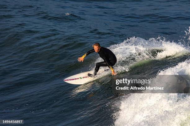 Surfer enjoys the waves at the rocky point of Scorpion Bay located in San Juanico on May 16, 2023 in Comondu, Mexico. Big-wave conditions in Baja...