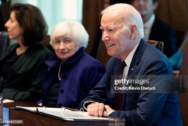 President Joe Biden delivers remarks alongside Treasury Secretary Janet Yellen and Commerce Secretary Gina Raimondo during a Cabinet Meeting at the...