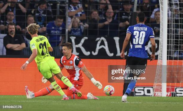 Benedict Hollerbach of Wiesbaden scores his teams first goalduring the Second Bundesliga playoffs second leg match between DSC Arminia Bielefeld and...