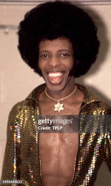 American musician Sly Stone poses for a portrait backstage prior to his concert and wedding, to Kathy Silva, at the Madison Square Garden in New...