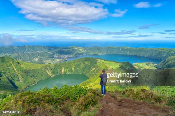 hiker at the caldera on são miguel island in the azores - azores people stock pictures, royalty-free photos & images