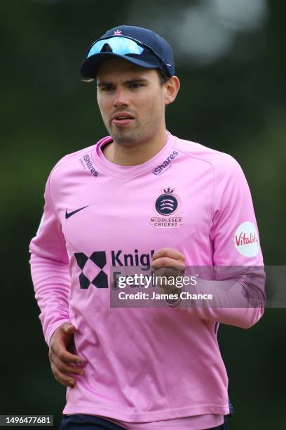 Max Holden of Middlesex looks on during the Vitality Blast T20 match between Middlesex and Hampshire Hawks at Radlett Cricket Club on June 06, 2023...