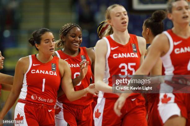 Yvonne Ejim of Canada smiles with teammate Aislinn Konig after making a shot versus Japan during a exhibition Basketball game at Save On Foods...