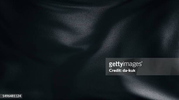 schwarzer luxus-seidentextilmaterialhintergrund - flowing silk stock-fotos und bilder