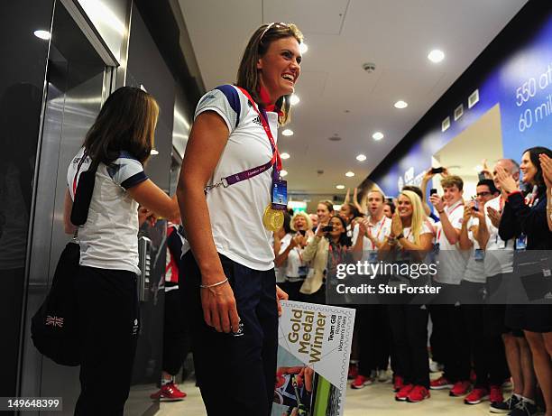 Team GB Rowing Gold medalists Helen Glover and Heather Stanning arrive to applause from staff at GB House in Stratford on August 1, 2012 in London,...