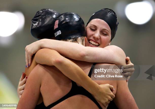 Shannon Vreeland , Missy Franklin , Allison Schmitt and Dana Vollmer of the United States celebrate after they won the Final of the Women's 4x200m...
