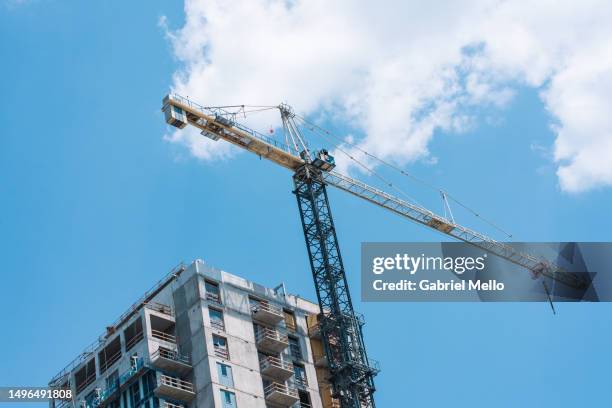 low angle pov of construction building - london ontario skyline stock pictures, royalty-free photos & images