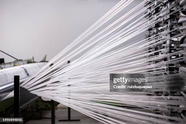 manufacture of coils of polyester threads - polypropylene stock pictures, royalty-free photos & images