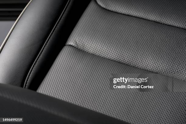 closeup shot of the black seat surface for driver inside a car - car interior no people stock pictures, royalty-free photos & images