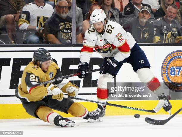 Brandon Montour of the Florida Panthers trips up Brett Howden of the Vegas Golden Knights in Game Two of the 2023 NHL Stanley Cup Final at T-Mobile...