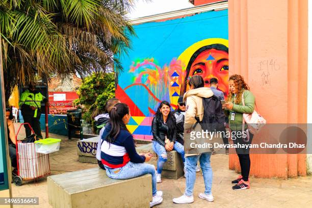 bogota, colombia - a local group of colombians on plaza chorro de quevedo in the candelaria district - plaza del chorro de quevedo stock pictures, royalty-free photos & images