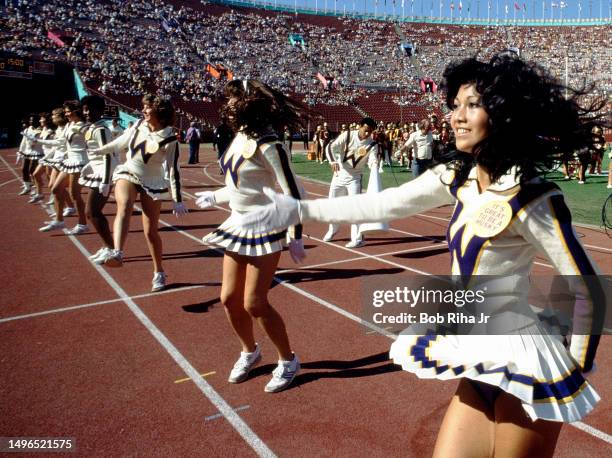 University of Washington Cheerleaders during game action between University of Southern California and University of Washington at Los Angeles...