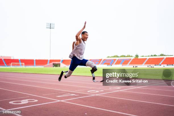 Sprinter Running Blade 8,302 Paralympic Sprinter Stock Photos, High-Res Pictures, and Images ...