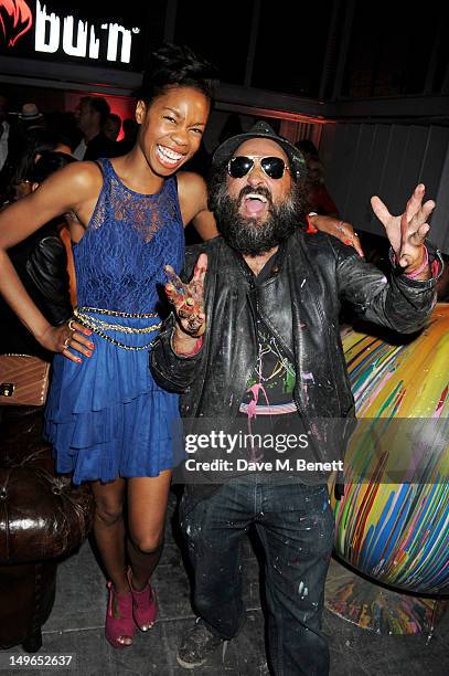 Tolula Adeyemi and Mr Brainwash attend as Burn Energy Drink presents DJ/Producer David Guetta and pop artist Mr Brainwash at The Old Sorting Office...